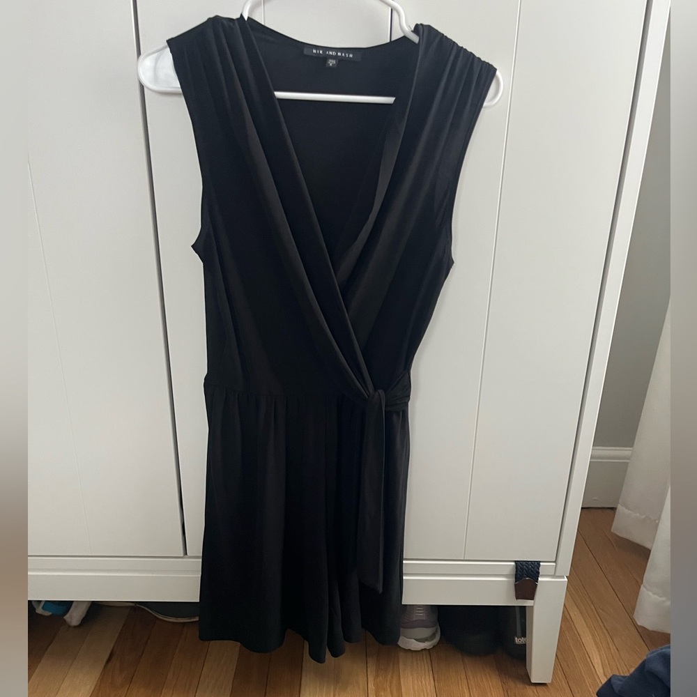 Nik and Nash Black Sleeveless Faux-Wrap Romper with Side Tie